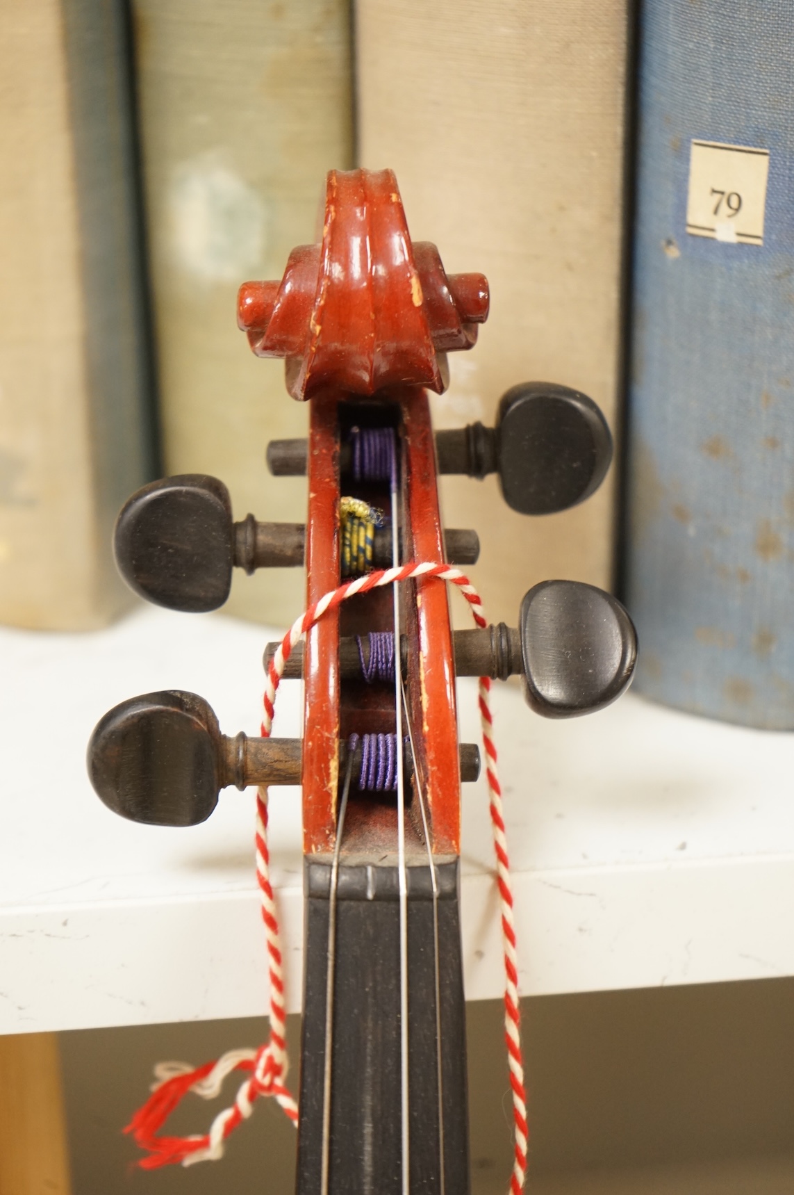 Three musical instruments to include a Buffet flute and violin with two bows